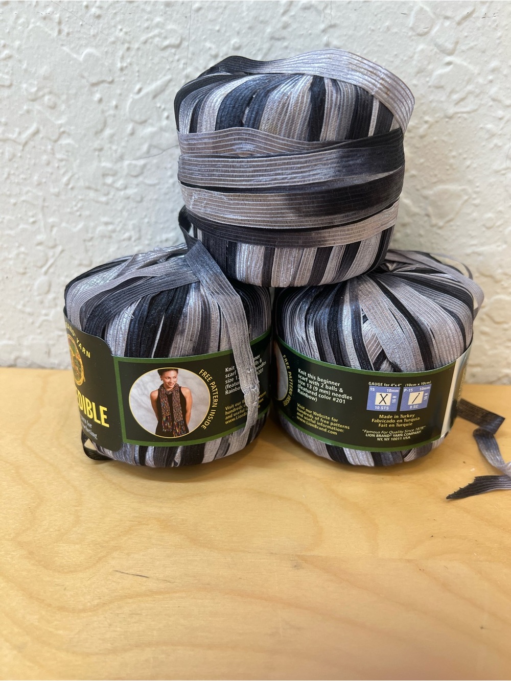Striped Black & Gray Ribbon yarn 3 skeins.